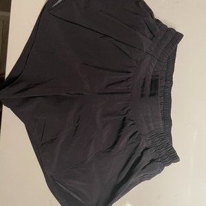 Black Lululemon Hotty Hot in 6Tall